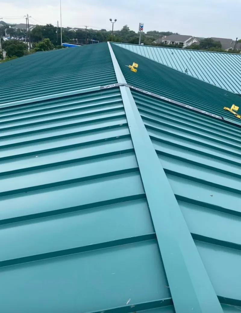 Green commercial metal roof ridge and valley for Metal Roof Repair in Ilion