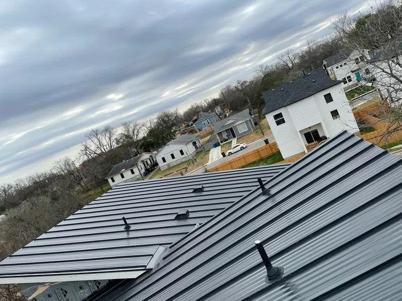 Standing seam metal roof panels with vents for Skylight Repair in Ilion